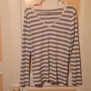 grey and white v neck long sleeve